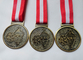 Подгонянный античный сплав латуни/меди/цинка покрывая медаль марафона HC Andersen с заливкой формы